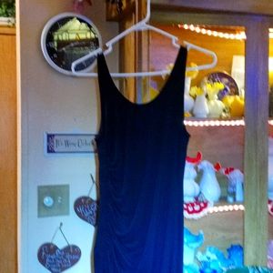 A beautiful sleeveless gown 60 in Long rouche on the right side of the dress